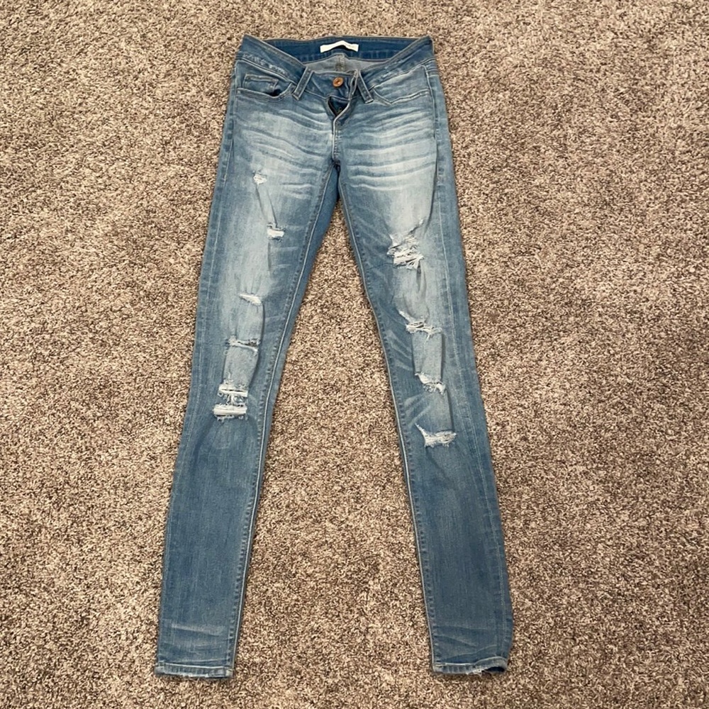 low rise ripped skinny jeans